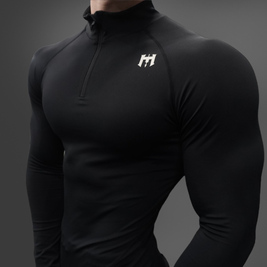 HMONG Half-Zip Compression 01 - 활동성을 강조한 하프집업 컴프레션 상의 제품 이미지