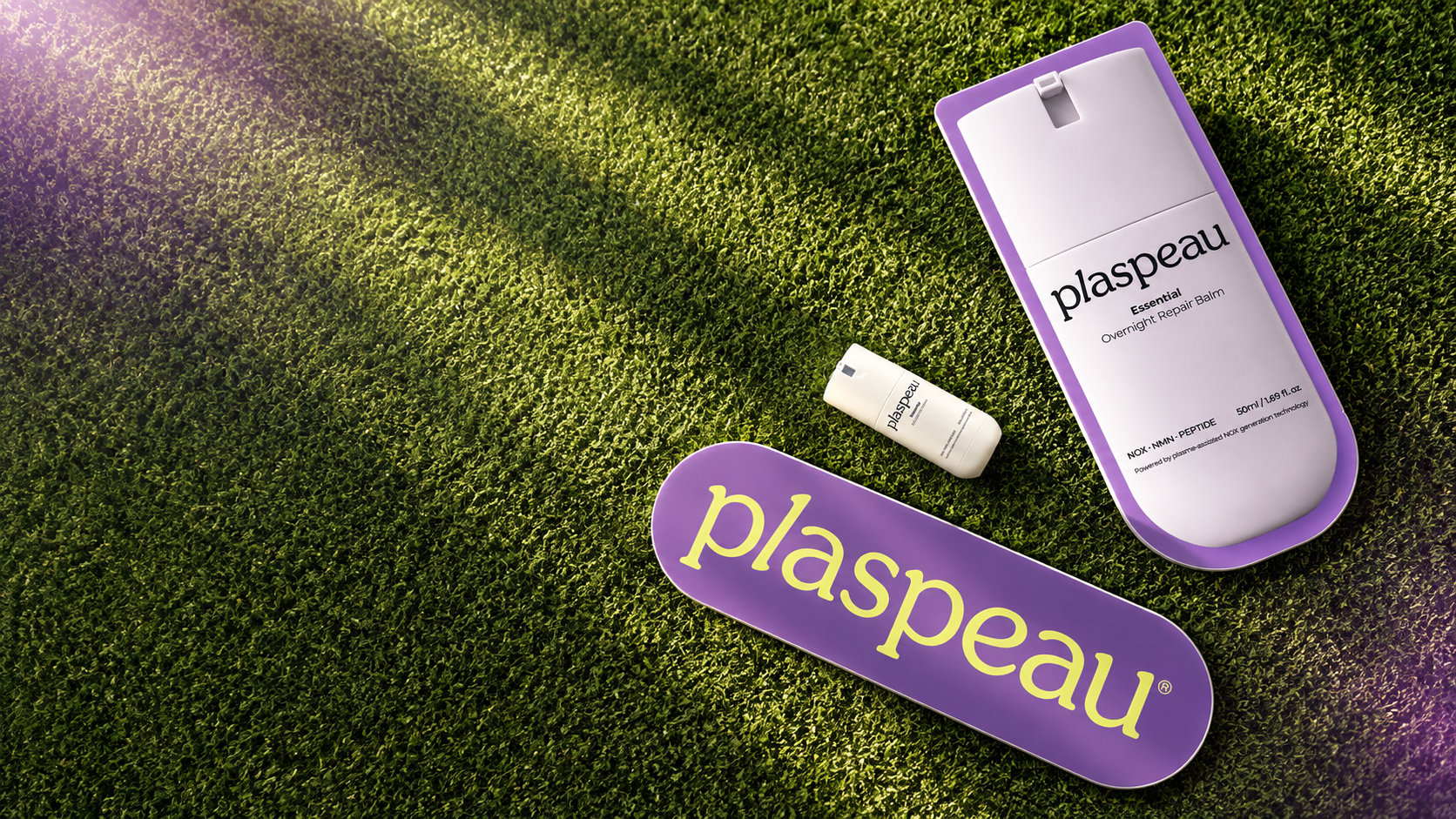 Lavender Plaspeau skincare and wordmark on a sunlit green field