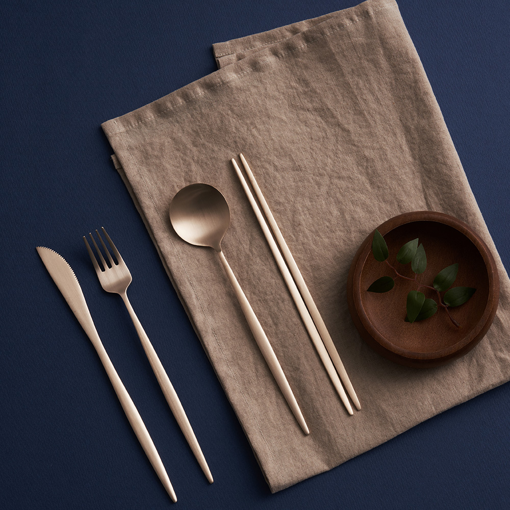 On cutlery set (spoon, fork, knife and chopsticks)