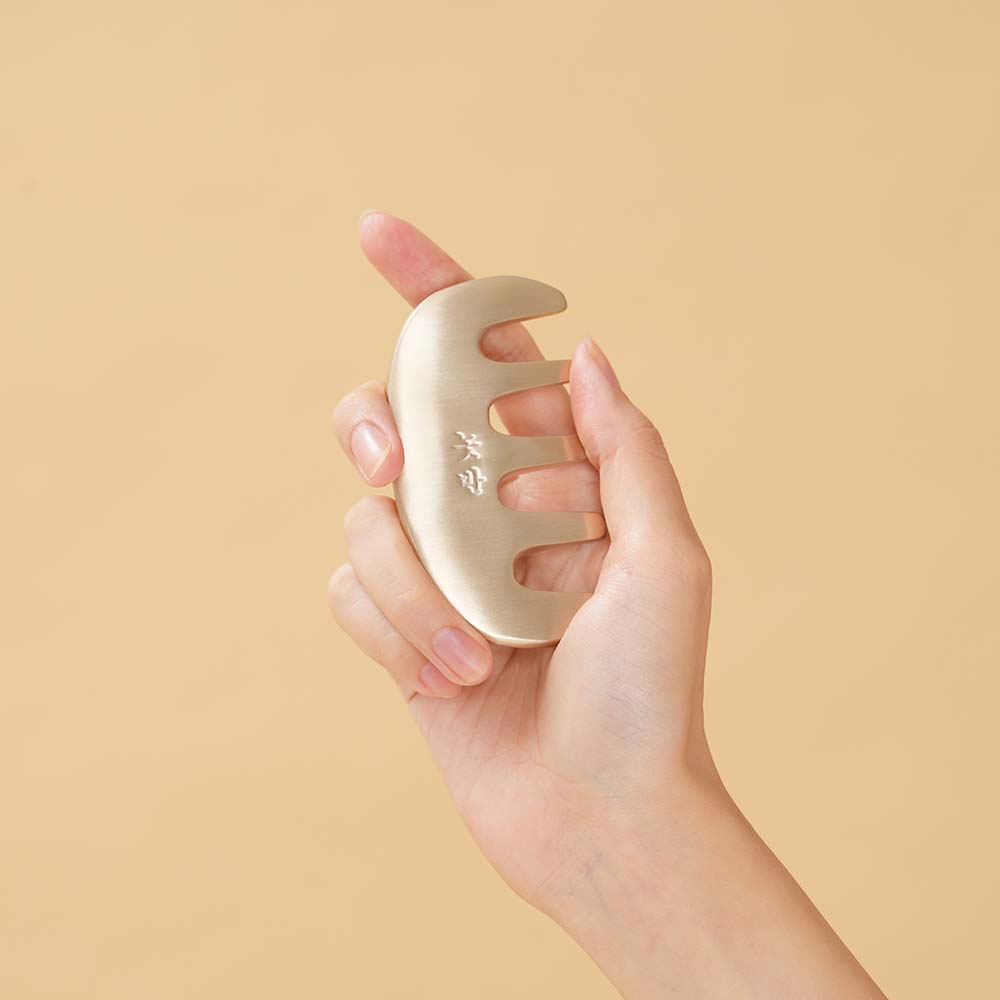 Gua sha comb for scalp massage