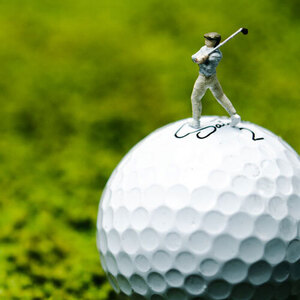 Mini figure of a man playing golf in 3 sizes