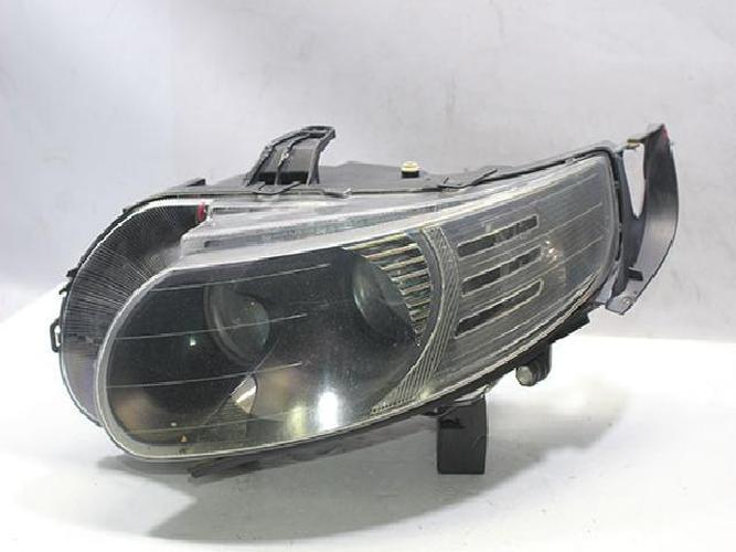 Фара передняя левая Saab (2000)